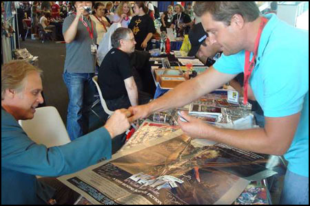 Carl Macek signs autographs